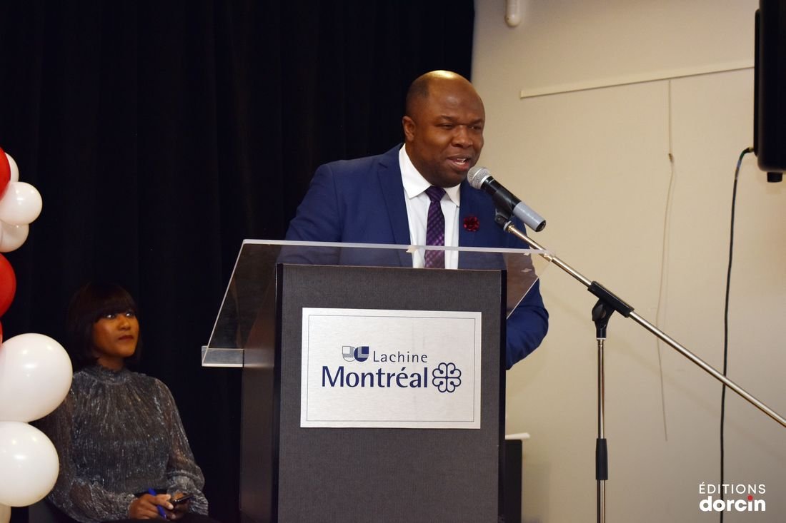 Marc Emmanuel Dorcin addressing guests at the podium